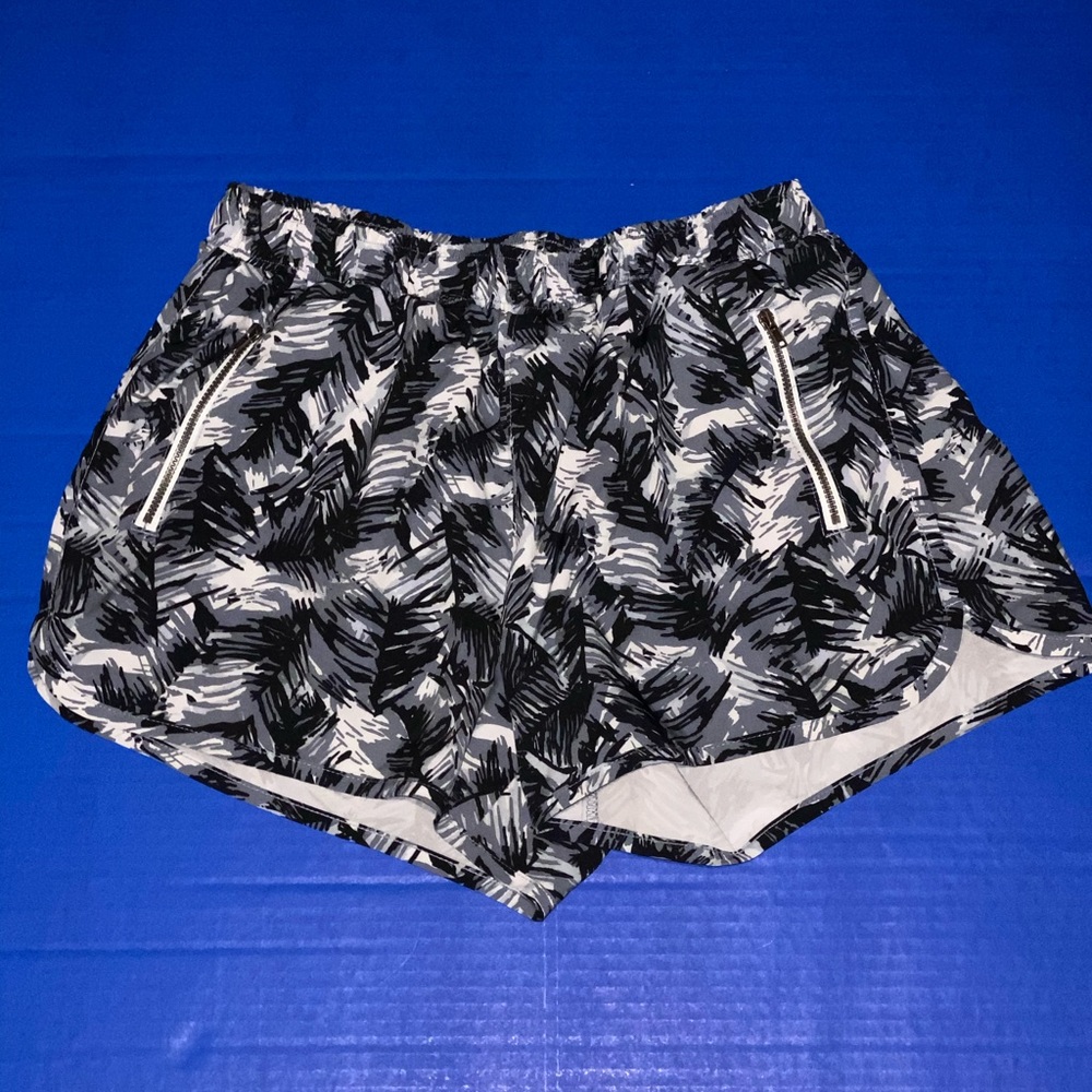 Black and white pattern athletic shorts.